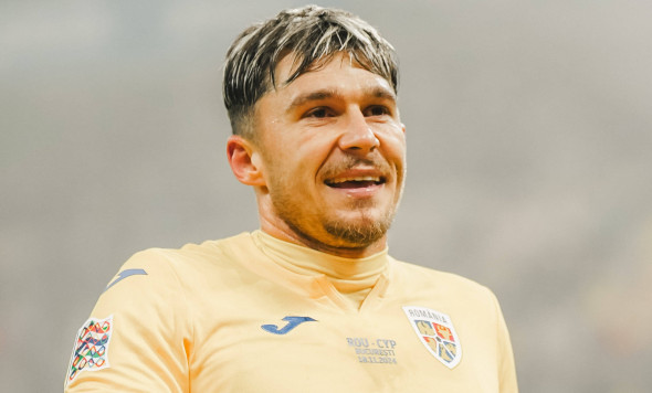 Nations League C, Group C2: Romania vs. Cyprus Andrei Ratiu celebrates with the fans in attendance after the Nations Lea