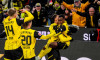 Dortmund, Germany. 30th Nov, 2024. DORTMUND, GERMANY - NOVEMBER 30: Jamie Gittens of Borussia Dortmund celebrates with Felix Nmecha of Borussia Dortmund after scoring his team's first goal during the Bundesliga match between Borussia Dortmund and FC Bayer