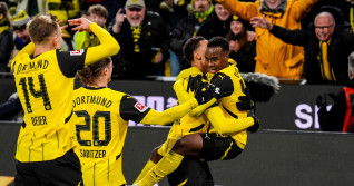 Dortmund, Germany. 30th Nov, 2024. DORTMUND, GERMANY - NOVEMBER 30: Jamie Gittens of Borussia Dortmund celebrates with Felix Nmecha of Borussia Dortmund after scoring his team's first goal during the Bundesliga match between Borussia Dortmund and FC Bayer