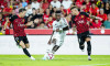 Mallorca, Spain, August 18, 2024, Vinicius Junior of Real Madrid and Takuma Asano of RCD Mallorca during the Spanish championship La Liga football match between RCD Mallorca and Real Madrid on August 18, 2024 at Son Moix stadium in Mallorca, Spain