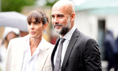 Manchester City manager Pep Guardiola with his wife Cristina Serra on day six of the 2024 Wimbledon Championships at the All England Lawn Tennis and Croquet Club, London. Picture date: Saturday July 6, 2024.