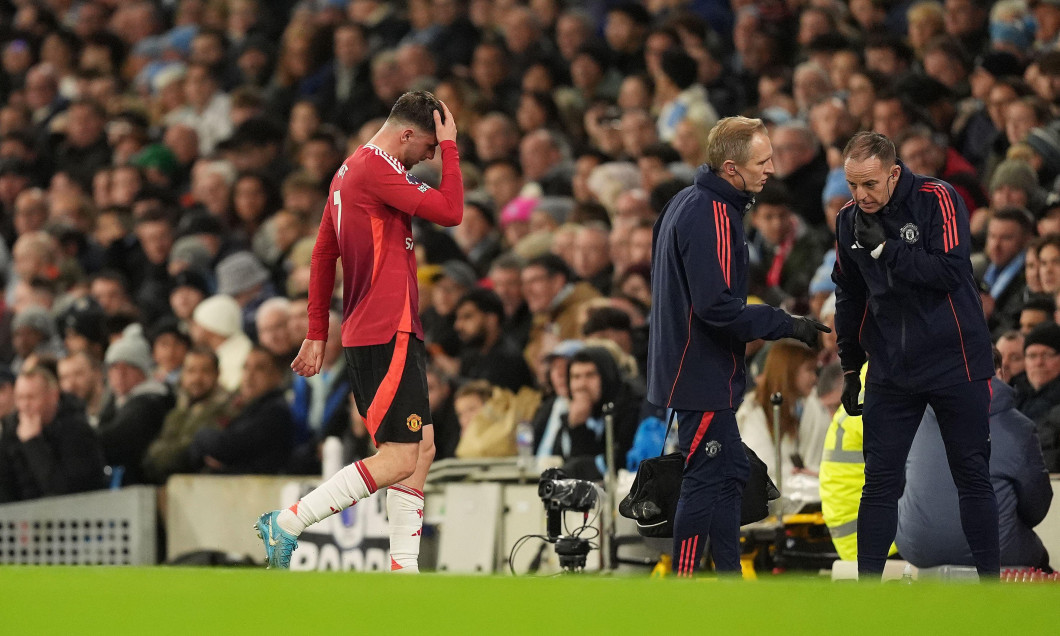 Manchester United's Mason Mount leaves the pitch after going down injured during the Premier League match at the Etihad Stadium, Manchester. Picture date: Sunday December 15, 2024.