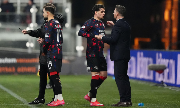 Rangers' Ianis Hagi (centre) embraces Rangers interim head coach Barry Ferguson as he is substituted during the William Hill Premiership match at The BBSP Stadium Rugby Park, Kilmarnock. Picture date: Wednesday February 26, 2025.