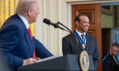 Washington, United States. 20th Feb, 2025. U.S President Donald Trump, left, welcomes golf legend Tiger Woods for Black History Month at the East Room of the White House, February 20, 2025 in Washington, DC. Credit: Daniel Torok/White House Photo/Alamy Li