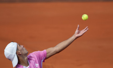 Sebastian Baez ARG ball action at serve