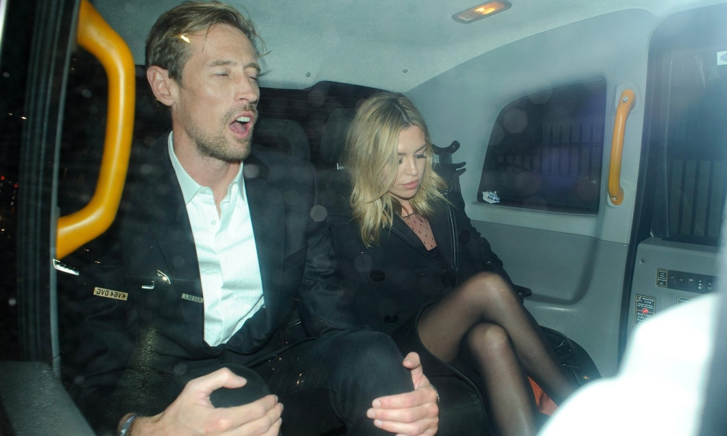 Abbey Clancy and Peter Crouch leaving Annabel's club