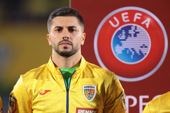 Serravalle, Italy. 24th Mar, 2025. Horatiu Moldovan of Romania looks on during the line up prior to kick off in the UEFA European Championship Qualifying match at San Marino Stadium, Serravalle. Picture credit should read: Jonathan Moscrop/Sportimage Cred