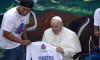 Rome, Italy. 19 May 2022. Pope Francis receives a football shirt from former Brazilian soccer player Ronaldinho during the launch of the 'Scholas Occurrentes', international educational movement at the Pontifical Urbaniana University. Credit: Maria Grazia