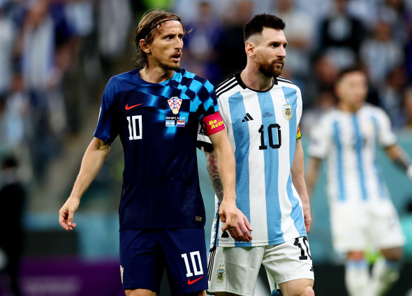 Doha, Qatar, 13th December 2022. Luka Modric of Croatia alongside Lionel Messi of Argentina during the FIFA World Cup 2022 match at Lusail Stadium, Doha. Picture credit should read: David Klein / Sportimage