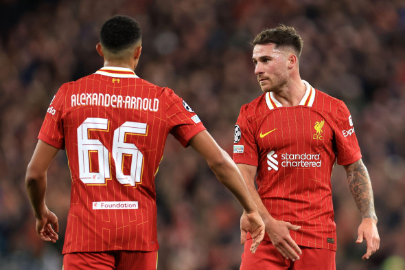 Liverpool, UK. 2nd Oct, 2024. Alexis Mac Allister of Liverpool speaks to teammate Trent Alexander-Arnold (obscured) during the UEFA Champions League match at Anfield, Liverpool. Picture credit should read: Jessica Hornby/Sportimage Credit: Sportimage Ltd/