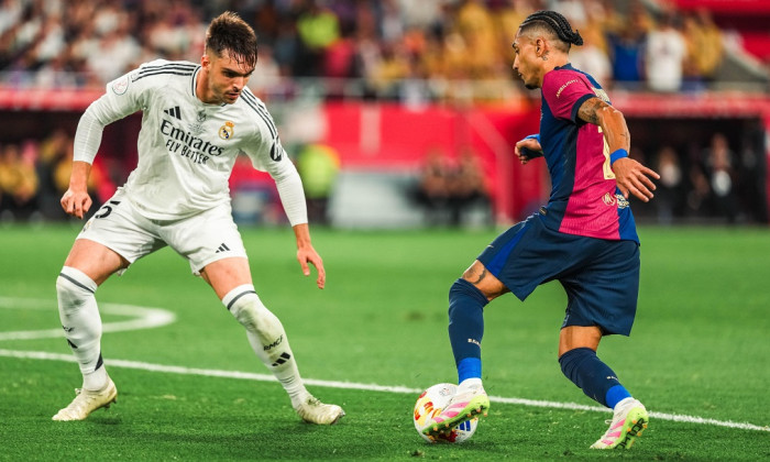 Raul Asencio of Real Madrid CF and Raphinha of FC Barcelona during the Spanish Cup, Copa del Rey, Final football match between FC Barcelona and Real Madrid on 26 April 2025 at Estadio de La Cartuja in Sevilla, Spain