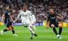 Kylian Mbappe of Real Madrid and William Saliba of Arsenal during the UEFA Champions League, Quarter-finals, 2nd leg football match between Real Madrid CF and Arsenal FC on 16 April 2025 at Santiago Bernabeu stadium in Madrid, Spain
