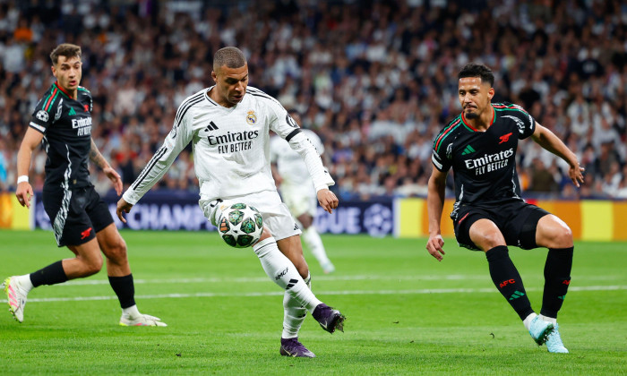 Kylian Mbappe of Real Madrid and William Saliba of Arsenal during the UEFA Champions League, Quarter-finals, 2nd leg football match between Real Madrid CF and Arsenal FC on 16 April 2025 at Santiago Bernabeu stadium in Madrid, Spain