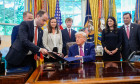 Donald Trump signs executive orders - Washington, United States - 09 May 2025