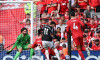 Liverpool, England, 11th May 2025. Conor Bradley of Liverpool blocks a shot from Gabriel Martinelli of Arsenal during the Liverpool vs Arsenal Premier League match at Anfield, Liverpool. Picture credit should read: Cody Froggatt / Sportimage