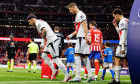Andrei Ratiu, Florian Lejeune and Pedro Diaz seen during LaLiga EA SPORTS game between teams of Atletico de Madrid and Rayo Vallecano at Estadio Civit