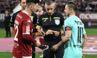 Capitanii Cristian Ionut Sapunaru si Ciprian Ioan Deac se saluta la meciul de fotbal dintre Rapid Bucuresti si CFR Cluj,