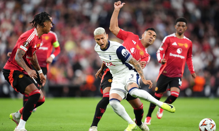 Manchester United's Casemiro and Tottenham Hotspur's Richarlison battle for the ball during the UEFA Europa League final at the Estadio de San Mames in Bilbao, Spain. Picture date: Wednesday May 21, 2025.