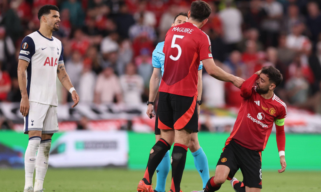 Bilbao, Spain, 21st May 2025. Bruno Fernandes of Manchester United holds his head after a challenge during the Tottenham Hotspur vs Manchester United UEFA Europa League Final match at San Mames, Bilbao. Picture credit should read: David Klein / Sportimage