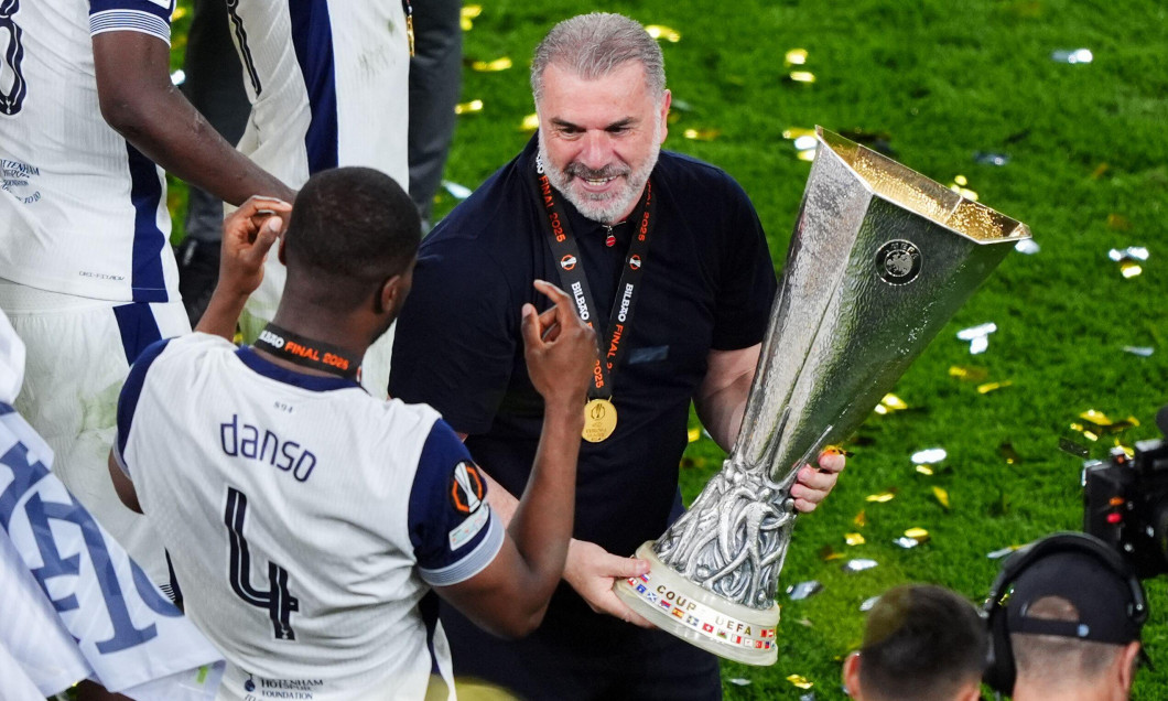 Tottenham Hotspur manager Ange Postecoglou and Kevin Danso with the Europa League trophy following his sides victory over Manchester United at the Estadio de San Mames, Bilbao, Spain. Picture date: Wednesday May 21, 2025.