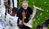 Tottenham Hotspur manager Ange Postecoglou and Kevin Danso with the Europa League trophy following his sides victory over Manchester United at the Estadio de San Mames, Bilbao, Spain. Picture date: Wednesday May 21, 2025.
