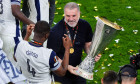 Tottenham Hotspur manager Ange Postecoglou and Kevin Danso with the Europa League trophy following his sides victory over Manchester United at the Estadio de San Mames, Bilbao, Spain. Picture date: Wednesday May 21, 2025.