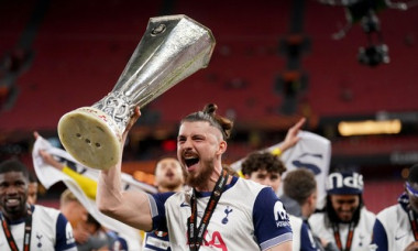 Tottenham Hotspur's Radu Dragusin celebrates with the trophy following the UEFA Europa League final at the Estadio de San Mames in Bilbao, Spain. Picture date: Wednesday May 21, 2025.