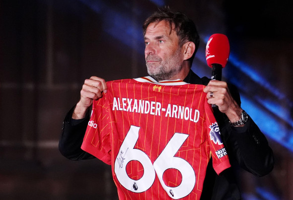 Jurgen Klopp holding a Trent Alexander-Arnold Liverpool shirt during the LFC Foundation Ball at Liverpool Anglican Cathedral. Picture date: Friday May 23, 2025.