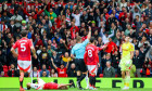 Referee Thomas Bramall red card Aston Villa goalkeeper Emiliano Martínez (23) could on Manchester United forward Rasmus Hojlund (9) during the Manchester United FC v Aston Villa FC English Premier League match at Old Trafford, Manchester, England, Unite