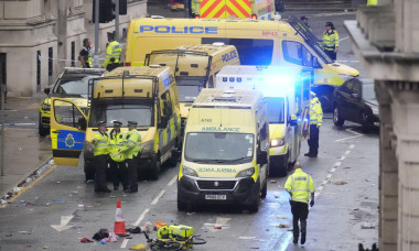 Police and emergency personnel dealing with a road traffic accident on Water Street near the Liver Building in Liverpool after a car collided with pedestrians during the Premier League winners parade. A man has been detained. Picture date: Monday May 26,