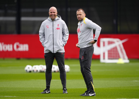 Liverpool manager Arne Slot (left) and assistant John Heitinga during a training session at the AXA Training Centre, Liverpool. Picture date: Tuesday October 1, 2024.