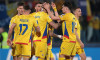 Serravalle, Italy. 24th Mar, 2025. Denis Alibec of Romania celebrates with team mates after scoring to give the side a 5-1 lead during the UEFA European Championship Qualifying match at San Marino Stadium, Serravalle. Picture credit should read: Jonathan