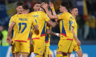 Serravalle, Italy. 24th Mar, 2025. Denis Alibec of Romania celebrates with team mates after scoring to give the side a 5-1 lead during the UEFA European Championship Qualifying match at San Marino Stadium, Serravalle. Picture credit should read: Jonathan