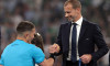 Munich, Germany. 31st May, 2025. UEFA President Aleksander Ceferin shakes hands with the Referee Istvan kovacs of Romania during the medals ceremony following the Paris Saint Germain vs Internazionale UEFA Champions League Final match at Munich Football A
