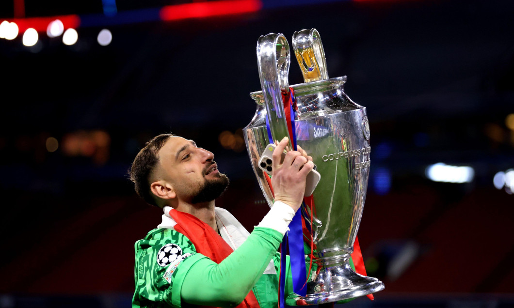 Gianluigi Donnarumma of Paris Saint-Germain Fc celebrates winning the Uefa Champions League with the trophy at the end the UEFA Champions League Final 2025 match between Paris Saint-Germain Fc and Fc Internazionale Milano at Munich Football Arena on May