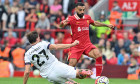 Illya Zabarnyi of Bournemouth tackles Mohamed Salah of Liverpool during the Premier League match Liverpool vs Bournemouth at Anfield, Liverpool, United Kingdom, 21st September 2024 (Photo by Cody Froggatt/News Images)