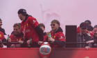 Liverpool Football Club Premier League Champions victory parade through the city of Liverpool, UK. Harvey Elliott with bottle