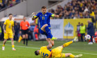 Andrei Burca of Romania and Edin Dzeko of Bosnia and Herzegovina in action during the FIFA World Cup 2026, Qualifiers, Group H football match between Romania and Bosnia-Herzegovina on 21 March 2025 at National Arena in Bucharest, Romania - Photo Mihnea Ta
