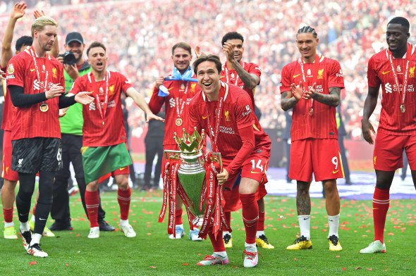 Liverpool, UK. 25th May, 2025. Federico Chiesa of Liverpool lifts the Premier League Trophy during the Liverpool vs Crystal Palace Premier League match at Anfield, Liverpool. Picture credit should read: Sportimage Credit: Sportimage Ltd/Alamy Live News