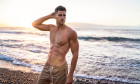 Handsome,Young,Muscular,Italian,Man,Posing,Shirtless,On,The,Beach,