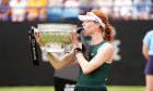 Maya Joint celebrates with the trophy after winning the Women's singles Final during day six of the Lexus Eastbourne Open at Devonshire Park Lawn Tennis Club, Eastbourne. Picture date: Saturday June 28, 2025.