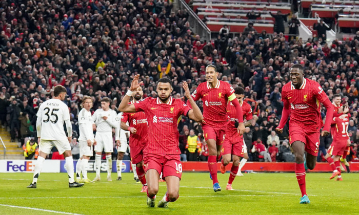 Liverpool forward Cody Gakpo (18) scores a GOAL 2-0 and celebrates with Liverpool defender Virgil van Dijk (4) and Liverpool defender Ibrahima Konate (5) during the Liverpool FC v Real Madrid CF UEFA Champions League Round 1 league phase Matchday 5 at Anf