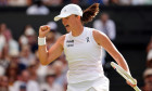 Iga Swiatek reacts during her Ladies' Singles Final against Amanda Anisimova on day thirteen of the 2025 Wimbledon Championships at the All England Lawn Tennis and Croquet Club, London. Picture date: Saturday July 12, 2025.