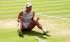 Iga Swiatek celebrates victory over Amanda Anisimova following the Ladies' Singles Final on day thirteen of the 2025 Wimbledon Championships at the All England Lawn Tennis and Croquet Club, London. Picture date: Saturday July 12, 2025.