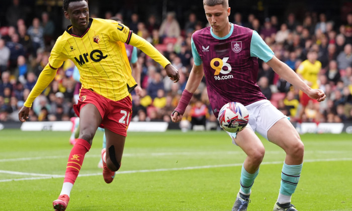 Watford’s Mamadou Doumbia (left) and Burnley's Maxime Esteve battle for the ball during the Sky Bet Championship match at Vicarage Road, Watford. Picture date: Friday April 18, 2025.