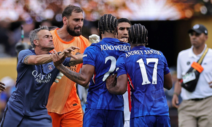 East Rutherford, United States. 12th July, 2025. Paris Saint-Germain's Spanish coach Luis Enrique (L) grabs the face of Chelsea's Brazilian forward Joao Pedro the match between Chelsea FC and PSG for the Final of the FIFA Club World Cup 2025, at MetLife S