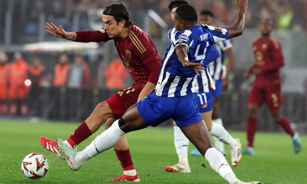 Rome, Italy 20.02.2025 : Paulo Dybala of Roma, Otavio of Porto seen in action during Uefa Europe League 2024-2025 football match, play-off, AS Roma v
