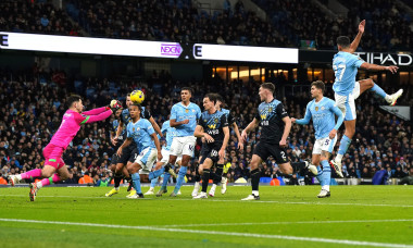 Burnley goalkeeper James Trafford (left) punches the ball clear from a Manchester City's Kevin De Bruyne (not pictured) free-kick during the Premier League match at the Etihad Stadium, Manchester. Picture date: Wednesday January 31, 2024.