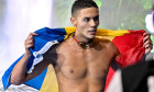 David Popovici of Romania reacts after winning the gold medal in the swimming 200m Freestyle Men Final during the 22nd World Aquatics Championships at the WAC Arena in Singapore (Singapore), July 29, 2025.