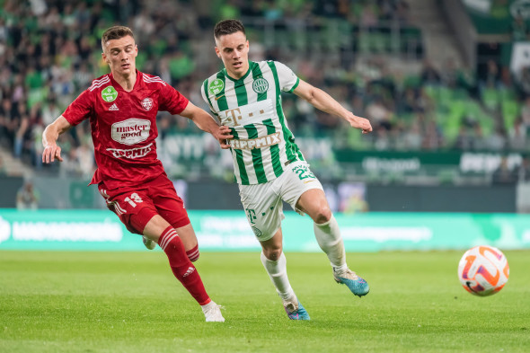 Budapest, Hungary – May 6, 2023. Kisvarda midfielder Bohdan Melnyk and Ferencvaros left-back Lorand Paszka during Hungarian League match Ferencvaros v